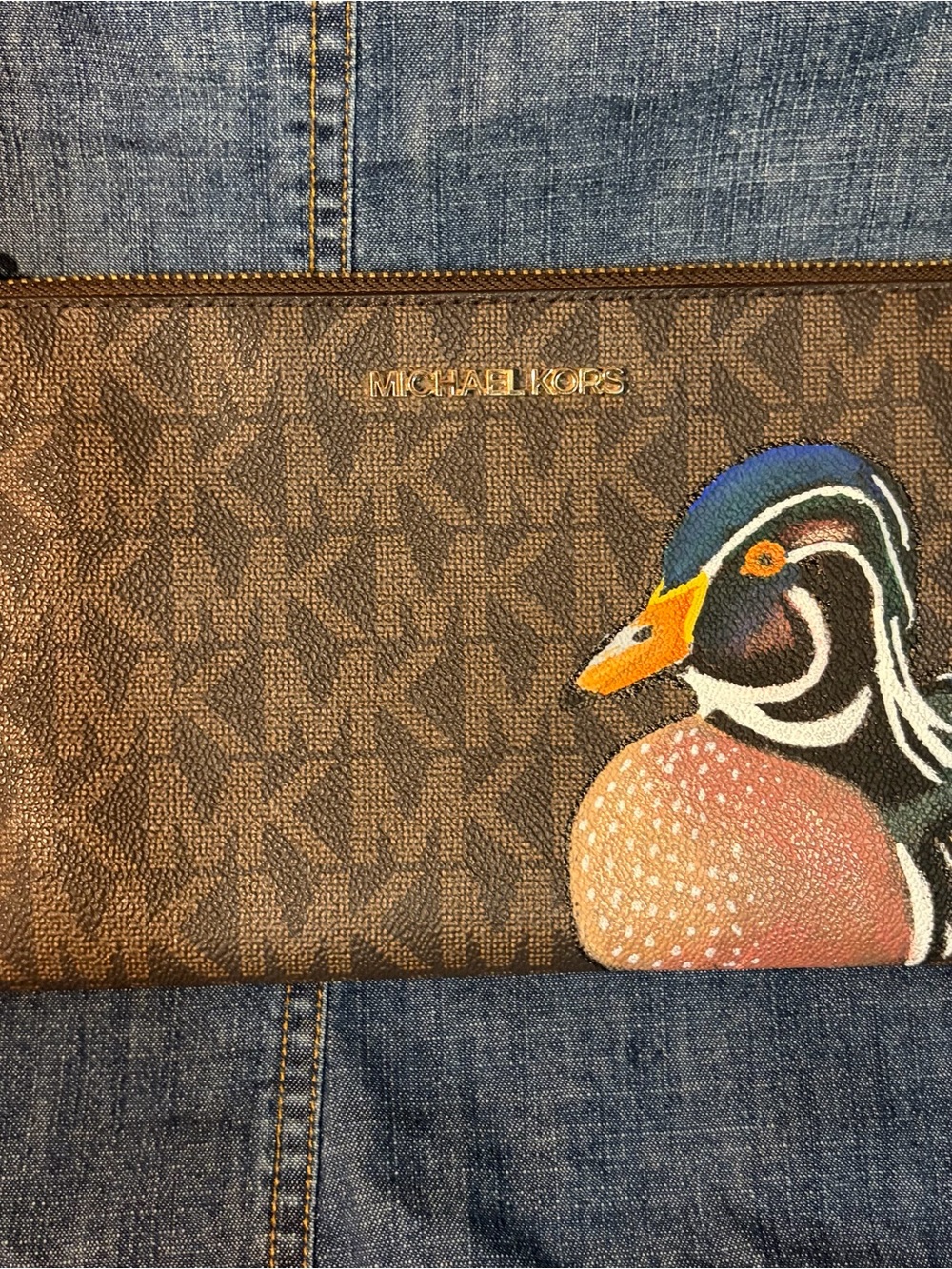Michael Kors Brown Logo Wristlet with Colorful Duck Illustration